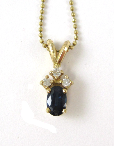 Appraisal: SAPPHIRE AND DIAMOND PENDANT NECKLACE Suspended on a - inch