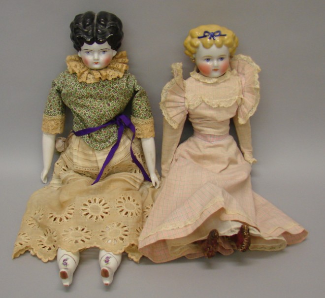 Appraisal: Pair of German china head dolls Lowbrow with black hair