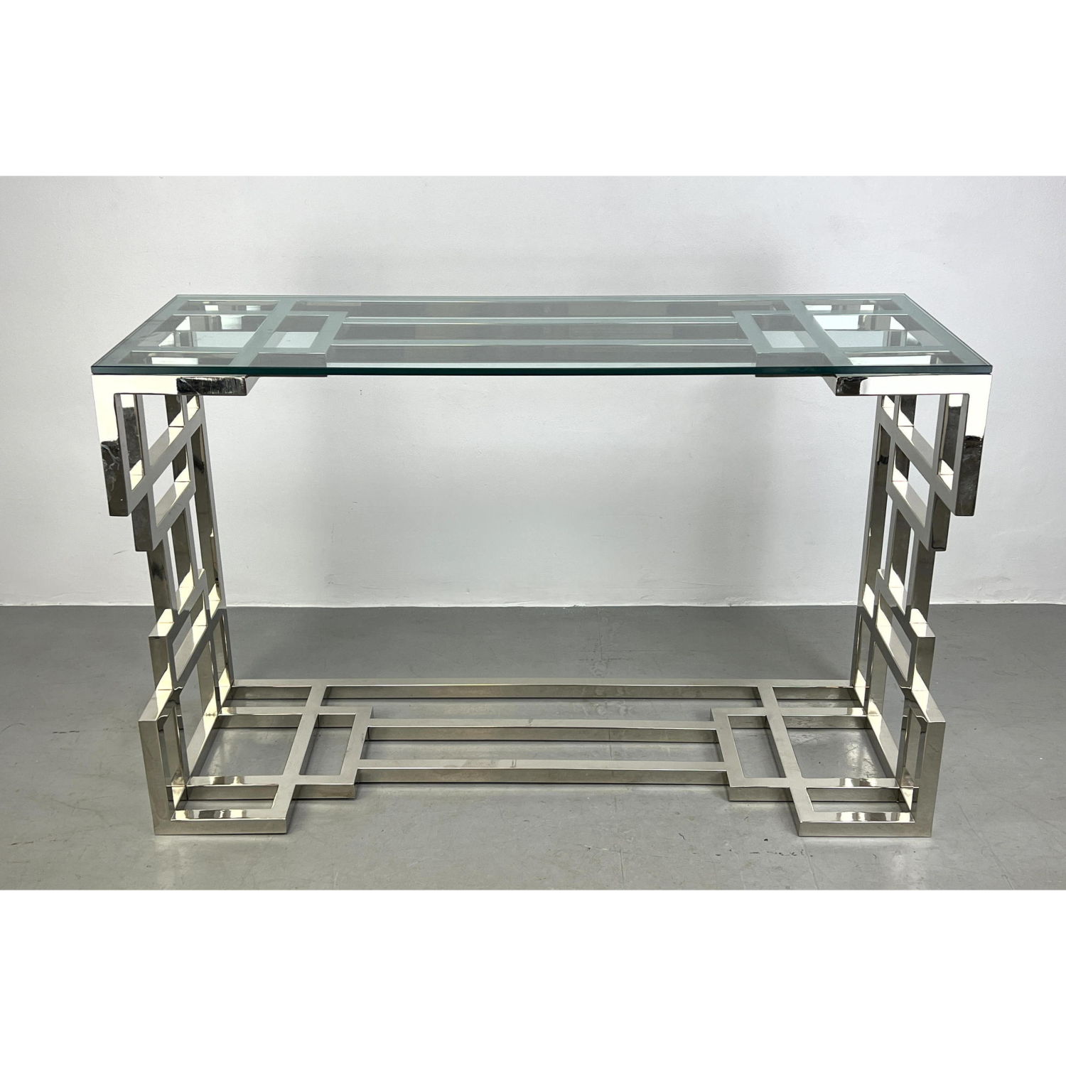 Appraisal: Contemporary glass and chrome console table with interlocking square tubular