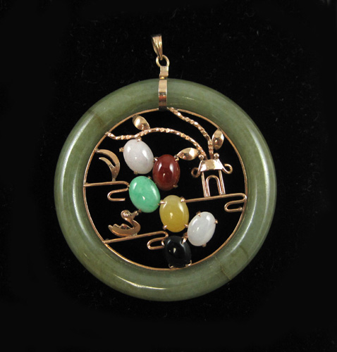 Appraisal: CHINESE MULTI-COLOR JADE PENDANT k yellow gold with a large