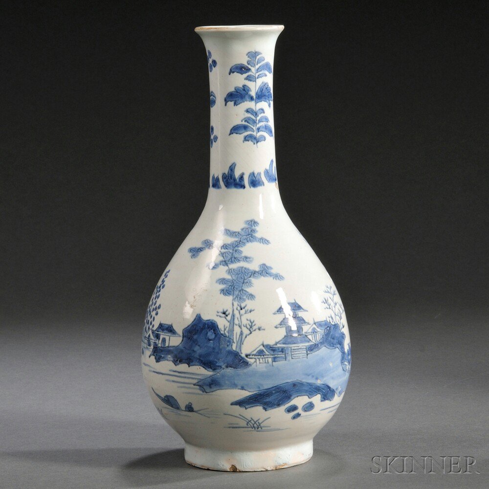 Appraisal: Delftware Blue and White Water Bottle England c decorated with