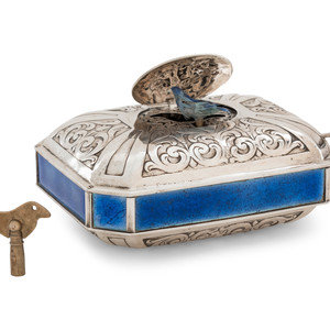 Appraisal: A German Silver and Enamel Singing Bird Automaton Box Last