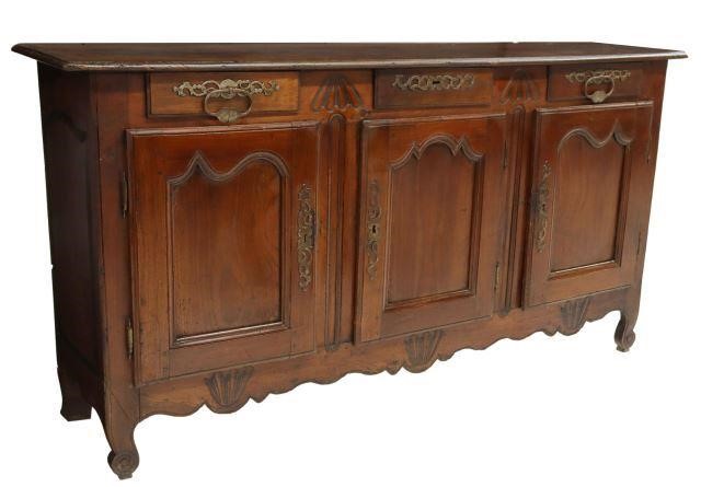 Appraisal: French Provincial Louis XV style oak and fruitwood sideboard early