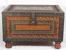 Appraisal: A heavy iron bound Indian chest with carved and brass