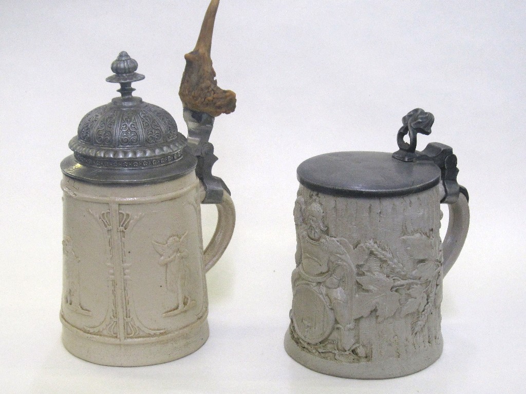 Appraisal: Stoneware pottery stein decorated in relief with vines hops and