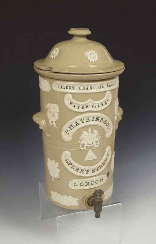 Appraisal: ENGLISH STONEWARE WATER FILTER WITH SPIGOT FH Atkins London Patent