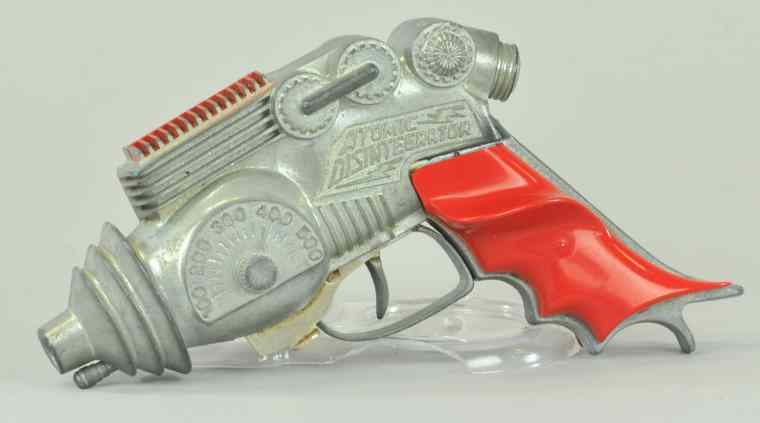 Appraisal: ATOMIC DISINTEGRATOR TOY PISTOL Hubley example made of die-cast with