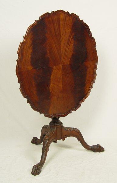 Appraisal: FLAME GRAIN MAHOGANY TILT TOP TABLE ''dia ''h when up