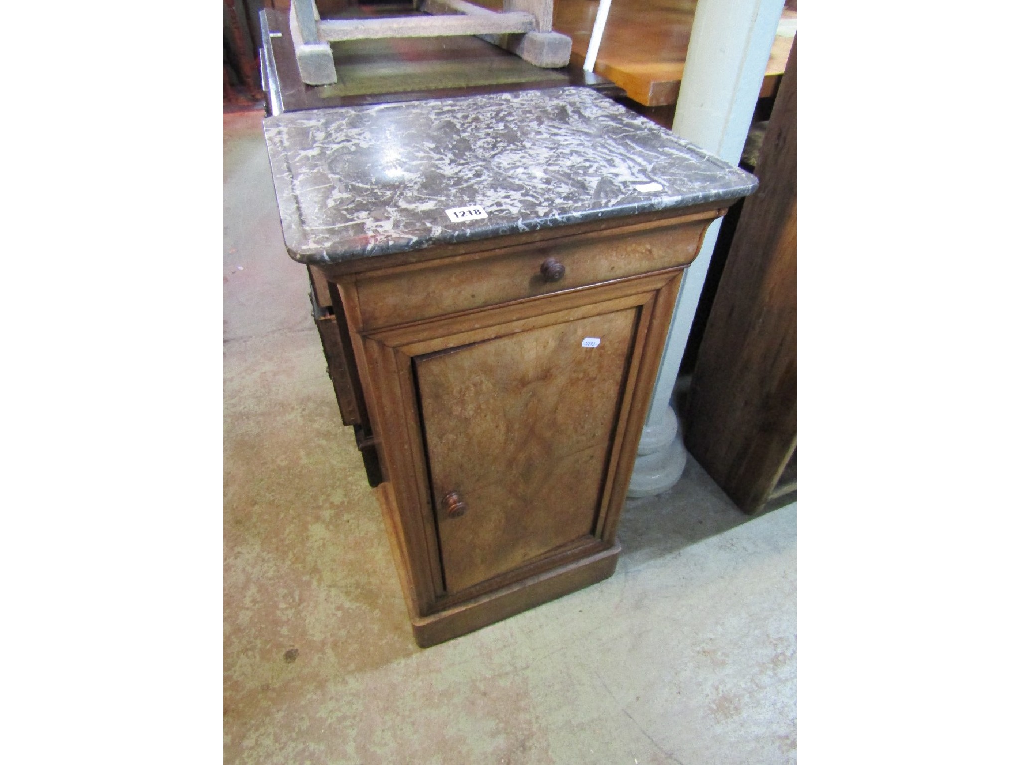 Appraisal: A th century walnut bedside cupboard enclosed by a single