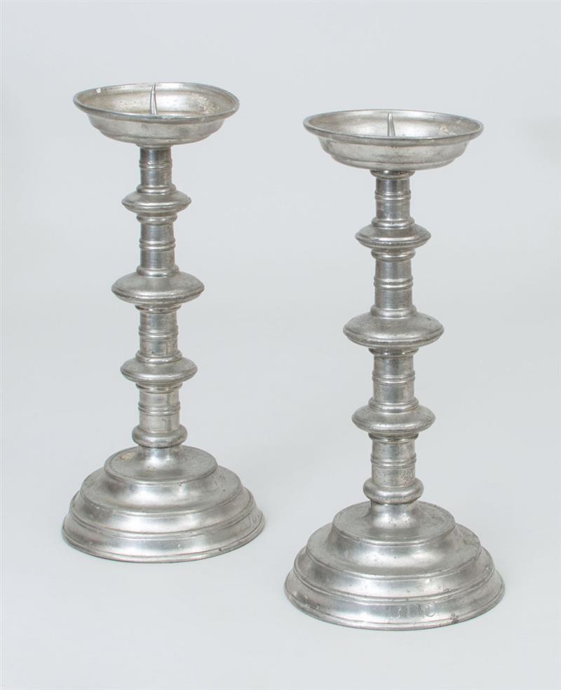 Appraisal: Pair of Continental Pewter Candlesticks Indistinct marks stamped to base