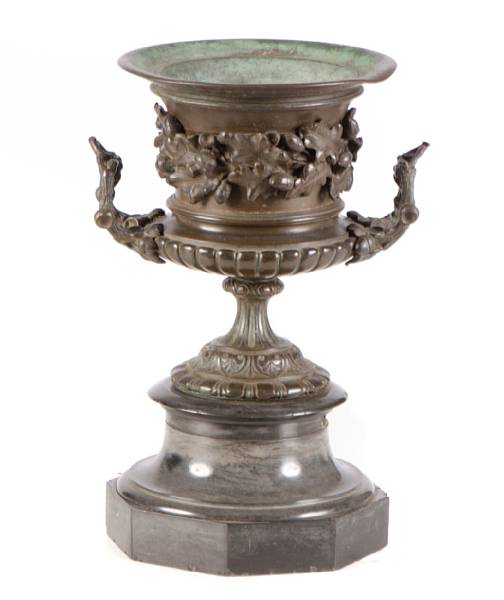 Appraisal: A pair of French bronze urns on marble bases height