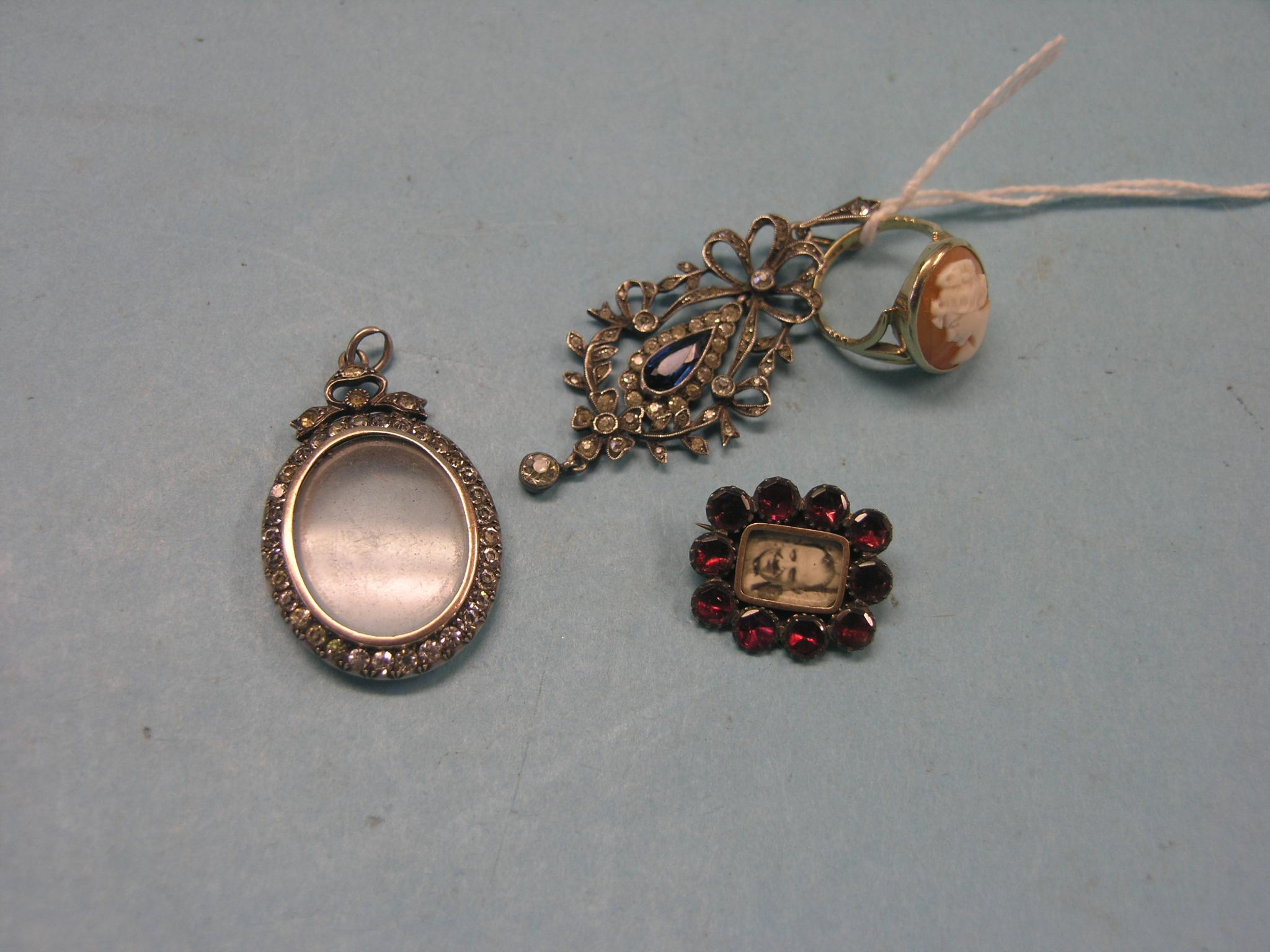 Appraisal: A ct gold cameo ring two Victorian paste pendants and