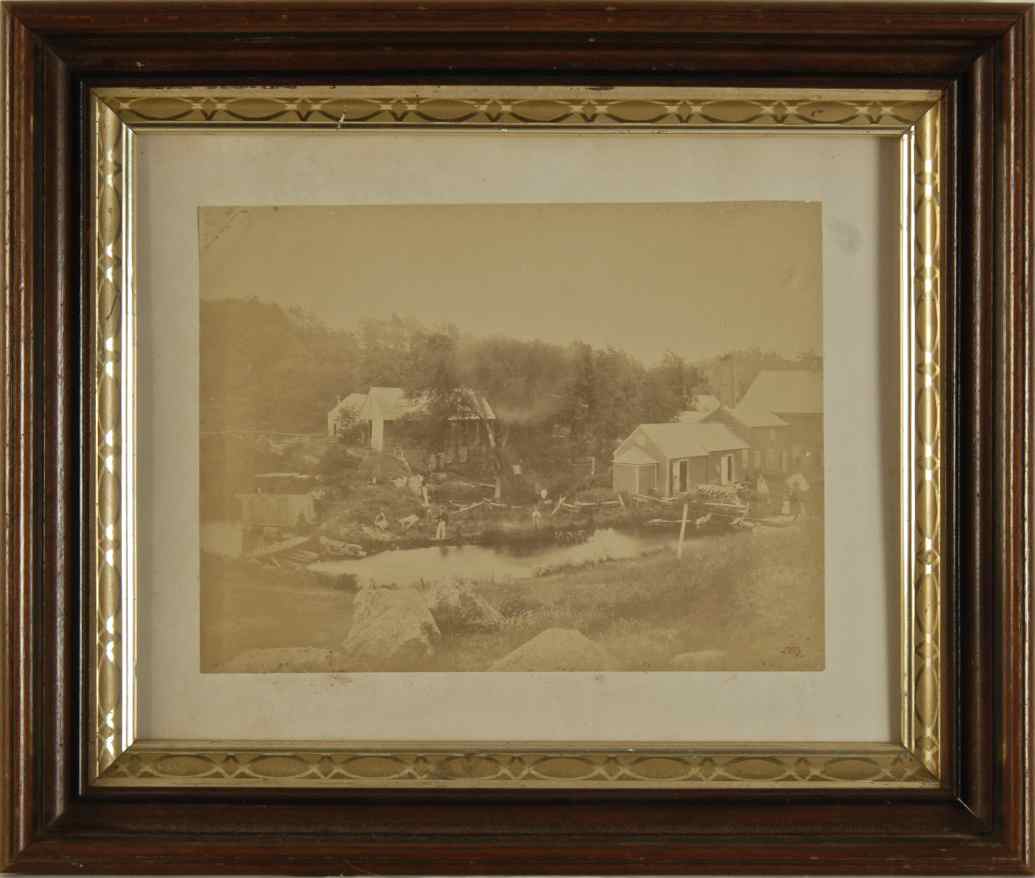 Appraisal: FRAMED PHOTOGRAPH th CenturyDepicting numerous figures along a pond's edge