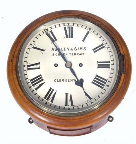 Appraisal: A VICTORIAN OAK CASED WALL CLOCK with double fus e