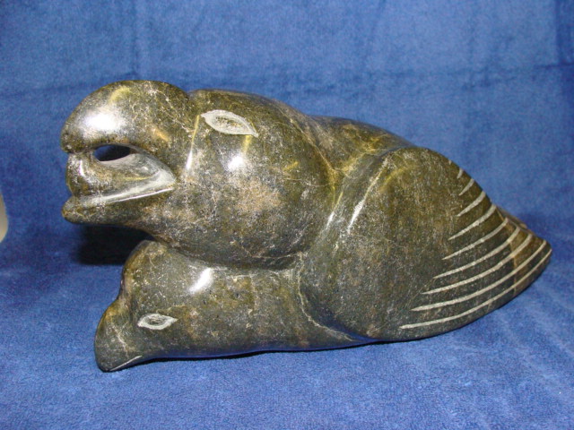 Appraisal: KENOJUAK ASHEVAK Inuit b Cape Dorset Raven with Young H