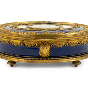 Appraisal: A French Gilt Metal and Enamel Table Casket with Portrait