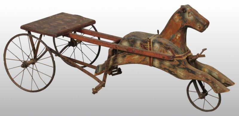 Appraisal: Wooden Child's Horse-Drawn Cart Description Pedal mechanism Horse has some