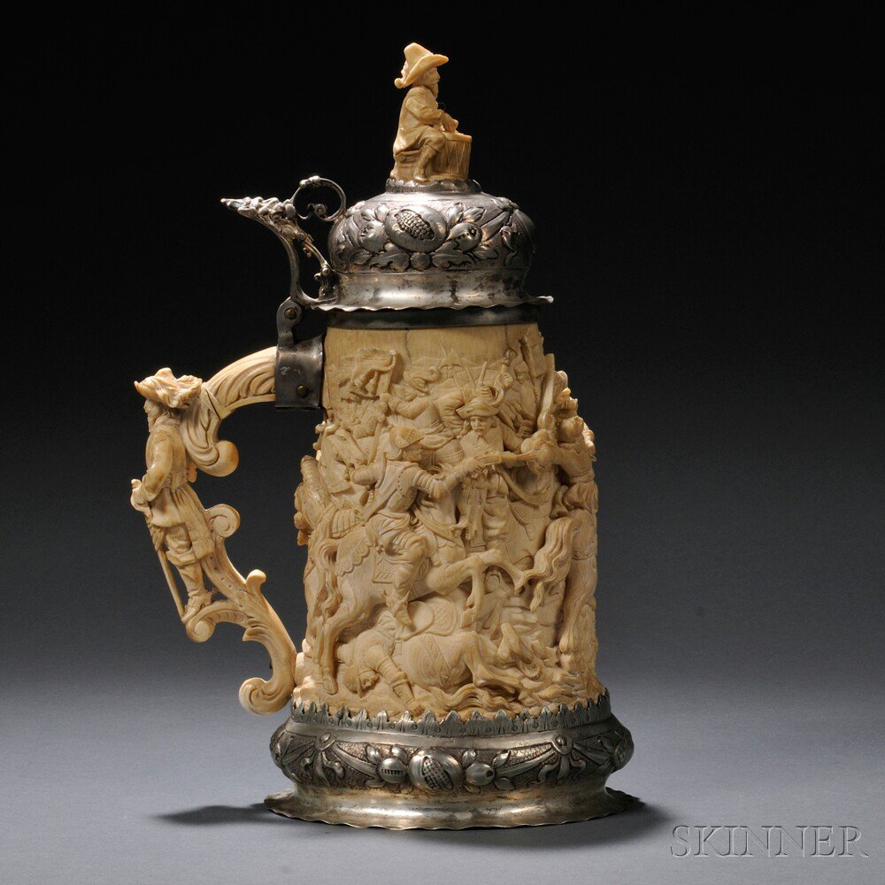 Appraisal: Silver-mounted Carved Ivory Tankard probably Germany th th century with