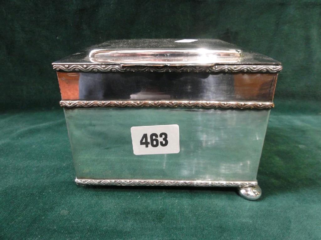 Appraisal: A silver plated cigarette box with embossed wavy line and