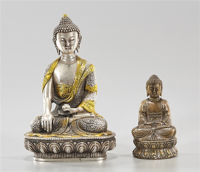 Appraisal: Two Chinese seated Buddhas one parcel-gilt x x approx Condition