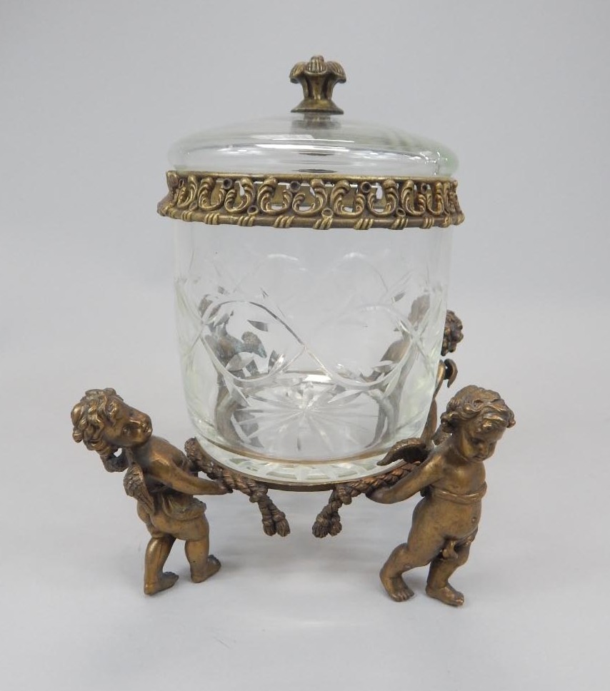 Appraisal: A thC cut glass biscuit barrel with gilt brass mounts