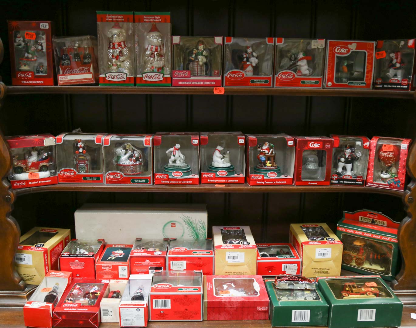 Appraisal: Three shelves of Coca-Cola Christmas ornaments Undernumber