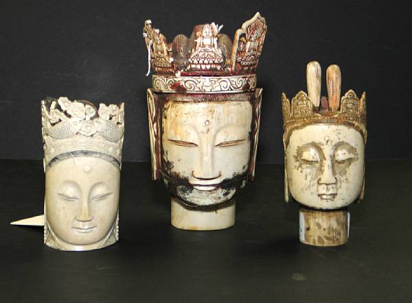 Appraisal: Three pieced ivory Buddhist heads Each crowned head possibly depicting