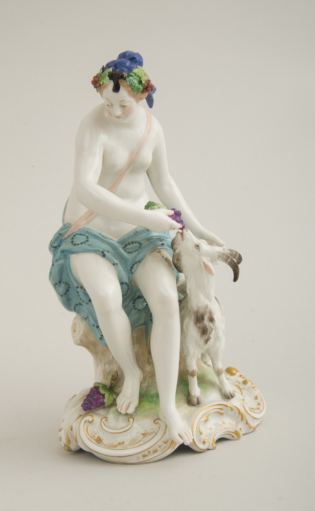 Appraisal: BERLIN PORCELAIN FIGURE OF A BACCHANTE FEEDING A GOAT Marked