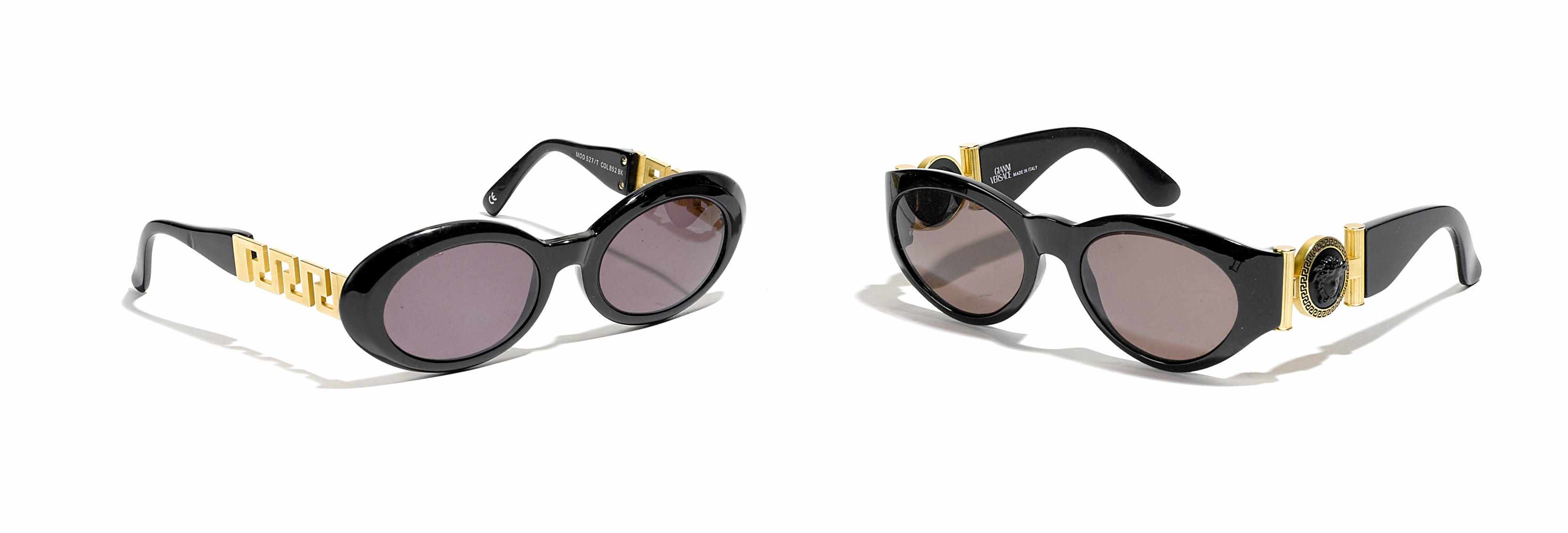 Appraisal: A pair of Gianni Versace gold and black sunglasses together