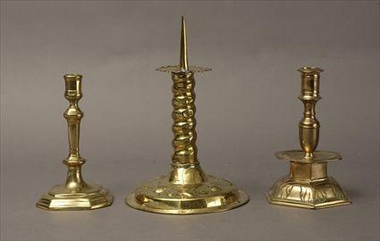 Appraisal: Two English and Continental Brass Candlesticks and a Continental Brass