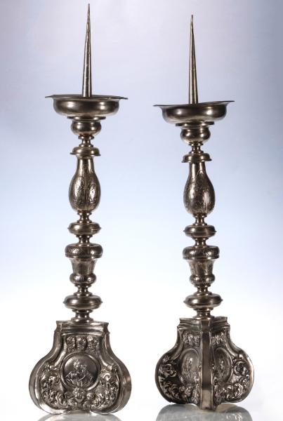 Appraisal: A PAIR OF TH TH CENTURY PRICKET ALTAR STICKSThe silver-plated