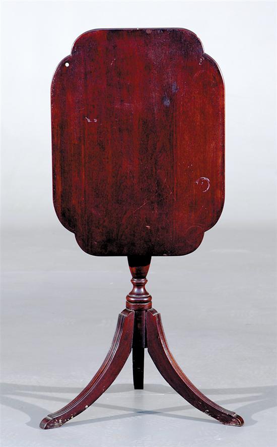 Appraisal: Federal style mahogany candlestand mid th century rectangular top with