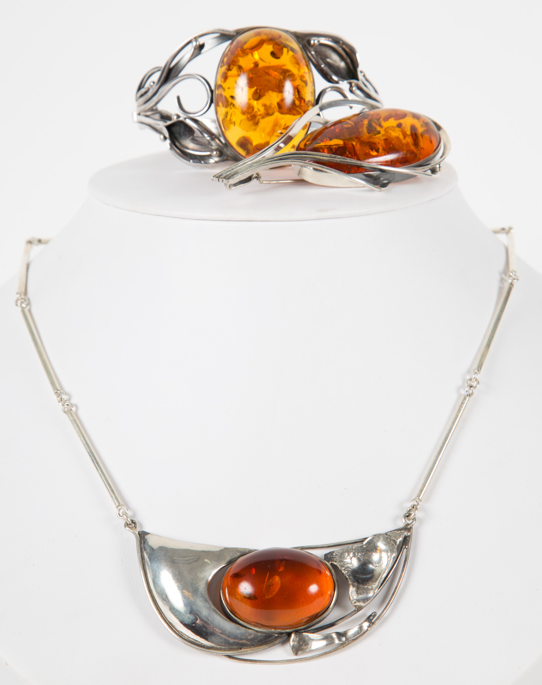 Appraisal: An Amber Necklace Bracelet and Pin