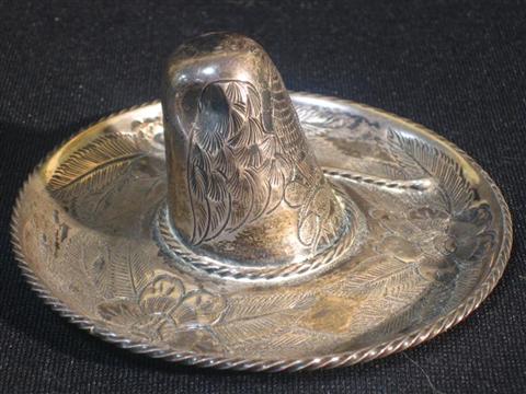 Appraisal: MEXICAN SILVER RING HOLDER Cast as a sombrero with a