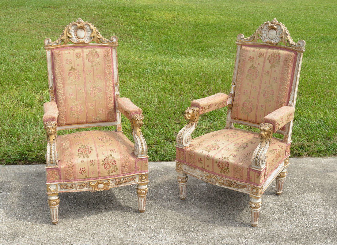 Appraisal: PAIR CONTINENTAL RENAISSANCE REVIVAL ARM CHAIRS Profusely carved and paint