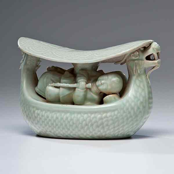 Appraisal: Celadon Pillow Chinese A porcelain celadon pillow carved in the