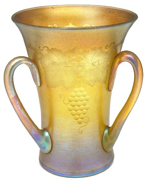 Appraisal: A Tiffany Favrile engraved glass three handled vase circa leaf