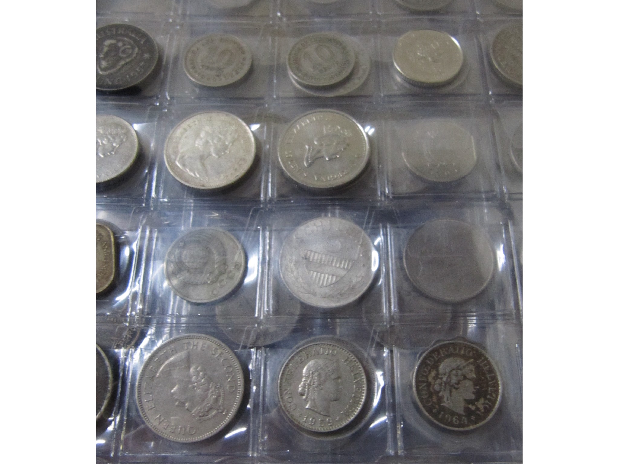 Appraisal: Five albums of assorted British and foreign coins to include