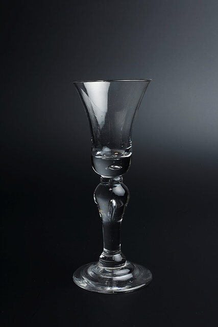 Appraisal: AN TH CENTURY WINE GLASS c with flared bowl on