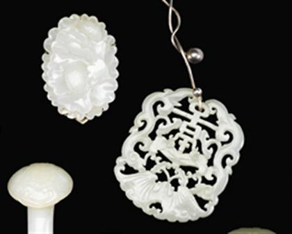 Appraisal: Two Chinese white jade pendants and four jadeite items qing