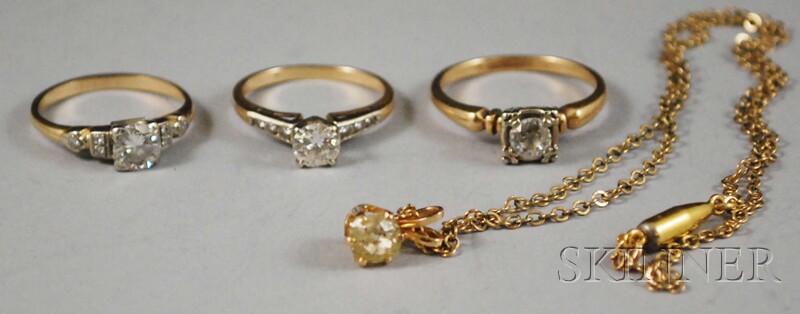 Appraisal: Four Gold and Diamond Jewelry Items three small diamond solitaires