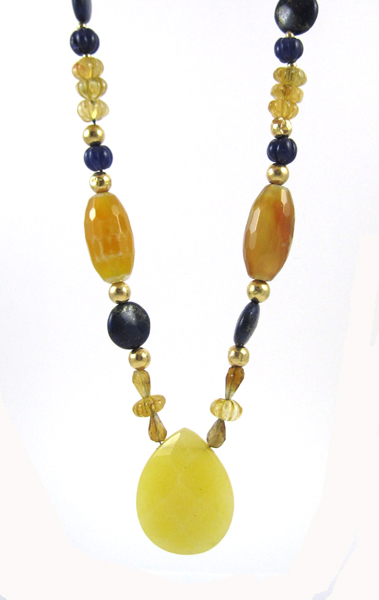 Appraisal: COLORED GEMSTONE AND FOURTEEN KARAT GOLD NECKLACE measuring inches in