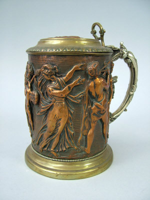 Appraisal: A silver plated and parcel gilt tankard of typical form