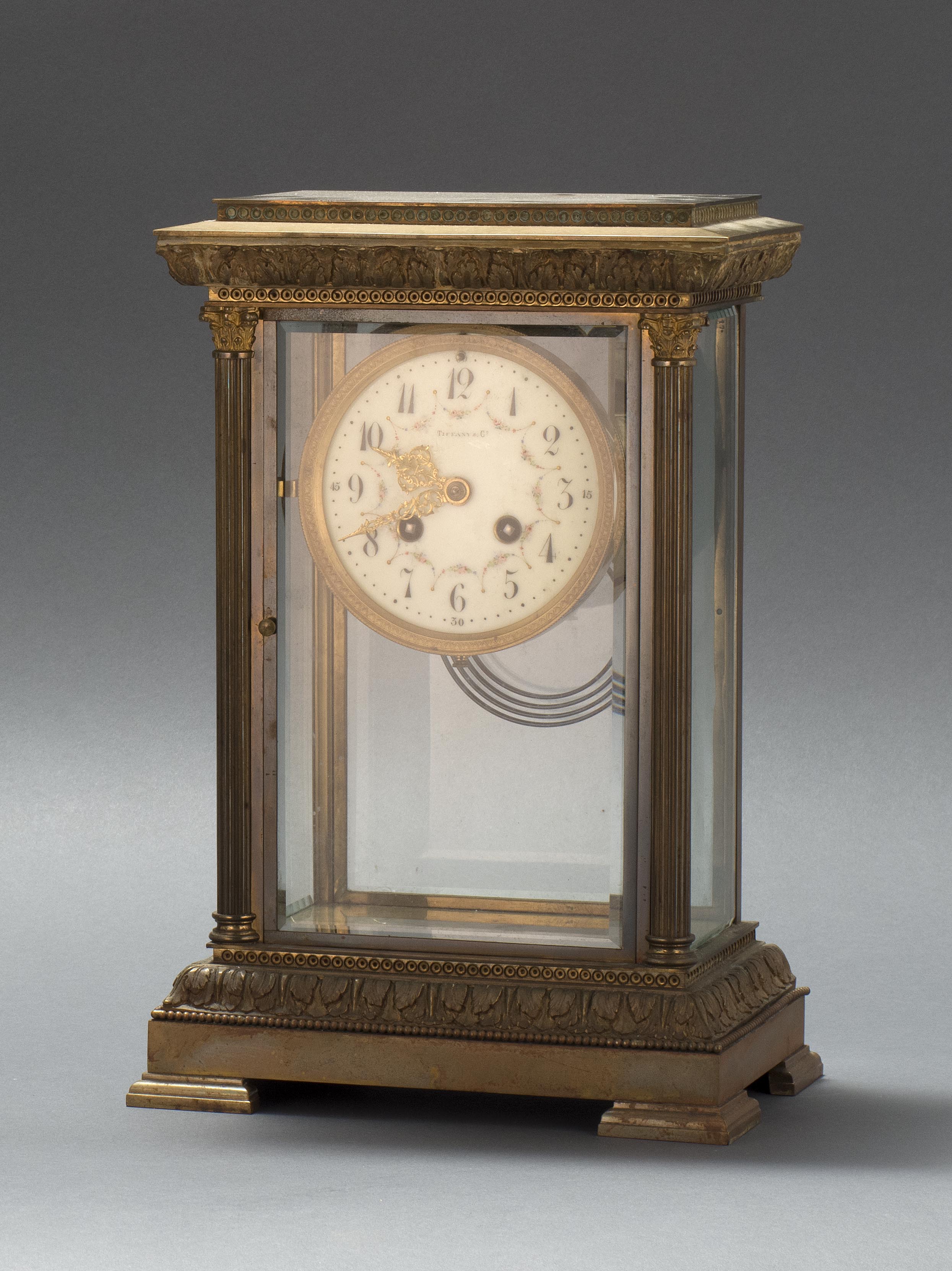 Appraisal: TIFFANY CO MANTEL CLOCK Brass with column and leaf decoration