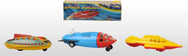 Appraisal: Lot of Rocket Ship Space Toys Description Working Includes one