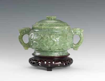 Appraisal: A Mottled Jade Pot with Lid Lid is carved with