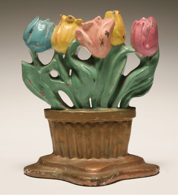 Appraisal: Cast iron tulip doorstop after a National Foundry design Painted