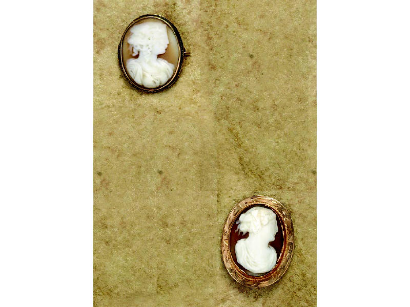 Appraisal: PAIR OF CAMEO BROOCHES Gold mounted cameos One with brooch