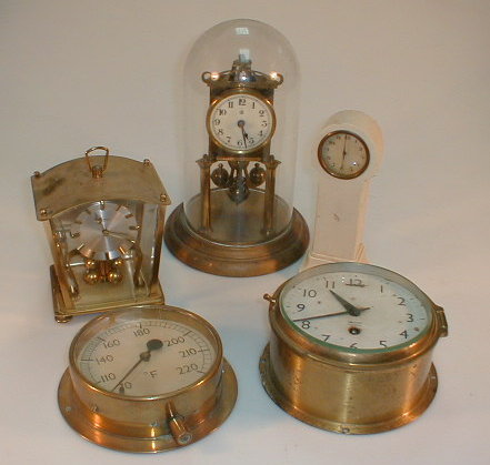 Appraisal: A Smiths Astral bulk head clock a temperature gauge and