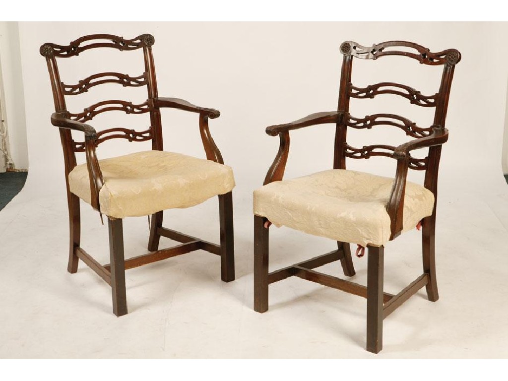 Appraisal: A PAIR OF GEORGE III MAHOGANY CHIPPENDALE STYLE ELBOW CHAIRS